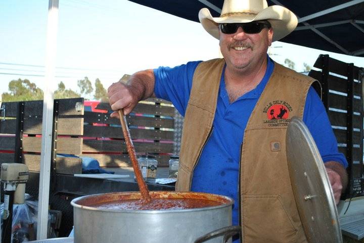 Lakeside Optimist Club volunteer cooking spaghetti